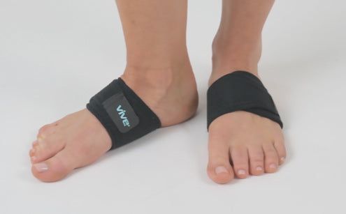 Feet wearing arc support