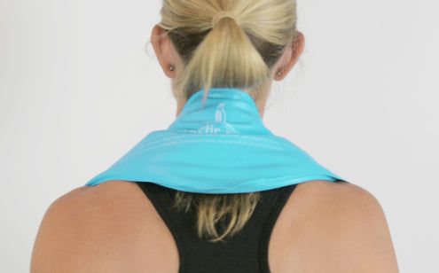 Woman using neck ice pack back view